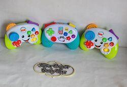 Розвиваючі джойстики Fisher price.