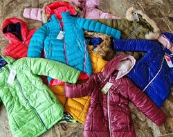 Розпродаж пуховиків на дівчаток