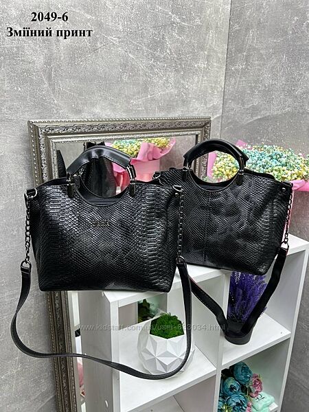 Жіночі сумочки зміїний принт