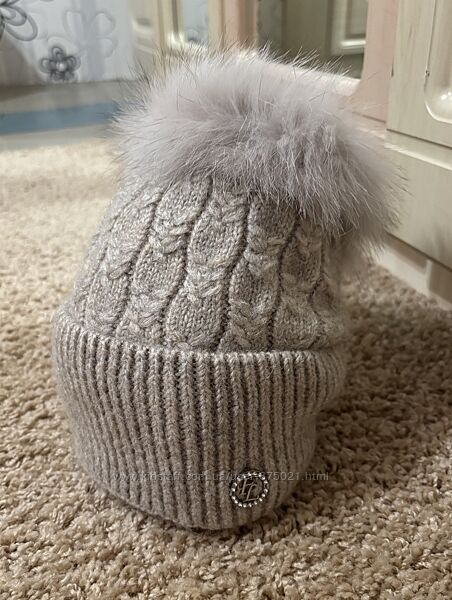 Зимова шапочка бубон з хутра