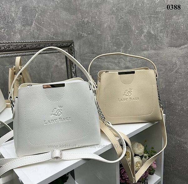 невелика сумка через плече стильний кросбоді в білий бежевий чорний