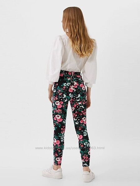 Жіночі джинси в квітковий принт