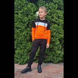 Спортивний костюм для хлопчика Тріо. Чорний з помаранчевим