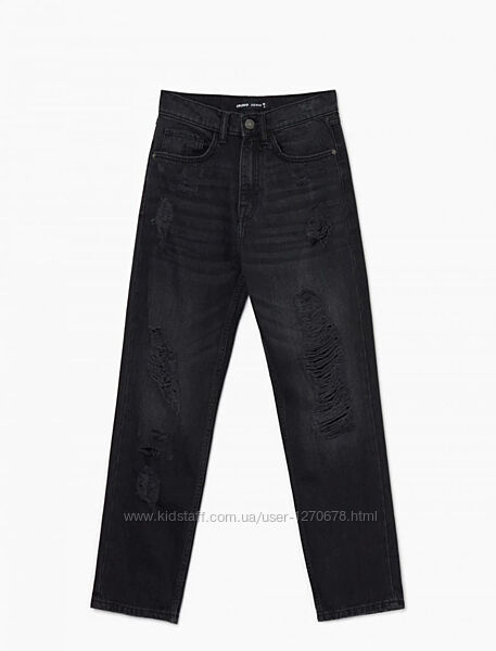 Нові рвані джинси з етикетками