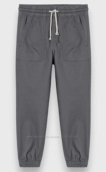 Коттоновые джоггеры хаки в принт динозавр H&M 128