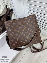 Гарна, стильна модель на 3 відділи з екошкіри Код 81766 