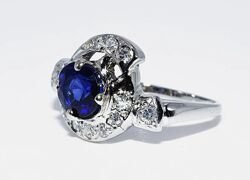 Платиновое кольцо с сапфиром 0.90k и бриллиантами 0.35k