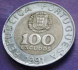 Монета Португалии 100 эскудо