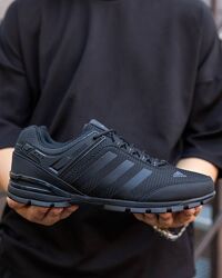 p.41  Adidas Terrex Light Total Black  AD022