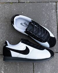 p.41, 46   Nike Cortez Black White  NK169