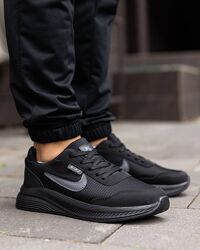 p.40 Nike Racer Total Black  NK185