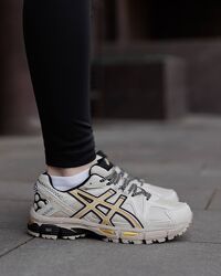 p.38, 41   Asics Gel Kahana 8 Beige Gold  AS001