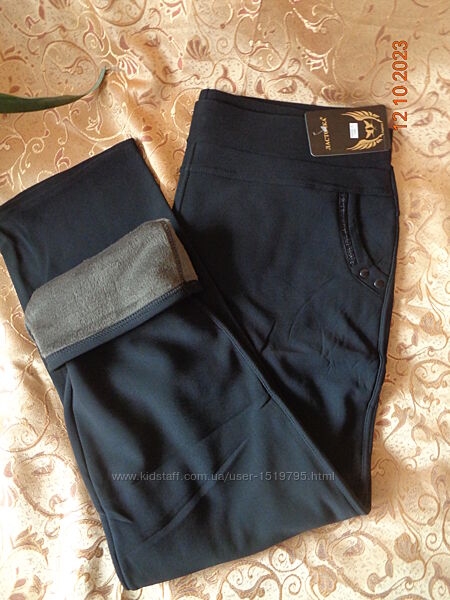Чорні теплі брюки на хутрі з кишенями 60/68