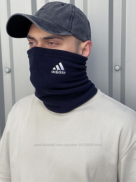 Чоловічий бафф Adidas Арт 1987798146 Бафф - це своєрідний розвиток ідеї шарфа, який пошитий у вигляді труби. Одягається через голову. У холодну погоду захищає частину обличчя та горло від вітру та холодного повітря (якщо натягнути його вище за нос). Також