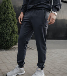 Спортивні штани на манжетах, кишені на застібках