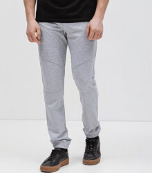 Спортивні штани на манжетах, кишені на застібках