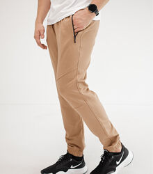 Спортивні штани на манжетах, кишені на застібках