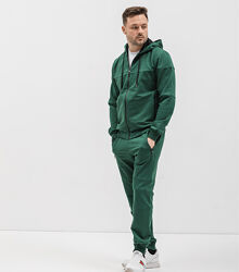 Спортивний костюм із кофтою на застібці та швами на штанах