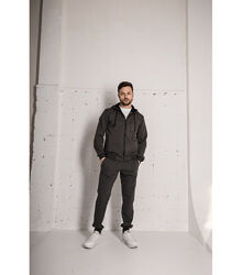 Спортивний костюм із кофтою на застібці та швами на штанах