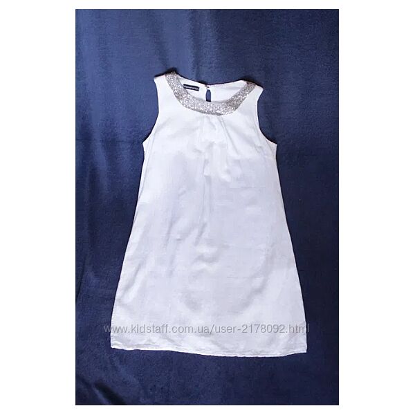 Напівпрозора біла льняна сукня з паєтками