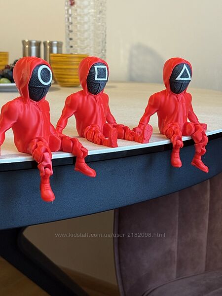 Фігурки з серіалу Гра в кальмара