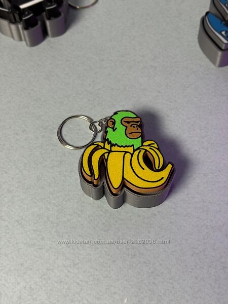 Брелок Шимпанзіні Бананіні  мемна мавпа-клікер