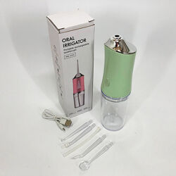 Іригатор для чищення зубів та порожнини рота 