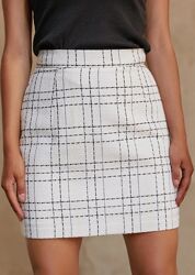 Елегантна твідова спідниця