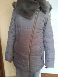 Продам дитячу зимову куртку б/в на худорляву дівчинку на зріст 150-158