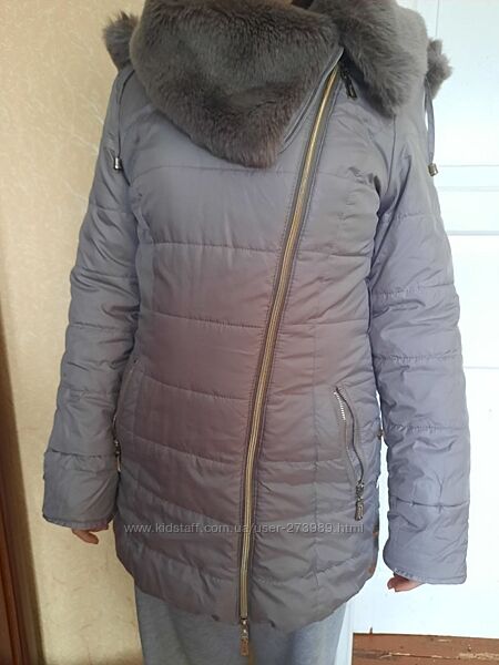 Продам дитячу зимову куртку б/в на худорляву дівчинку на зріст 150-158